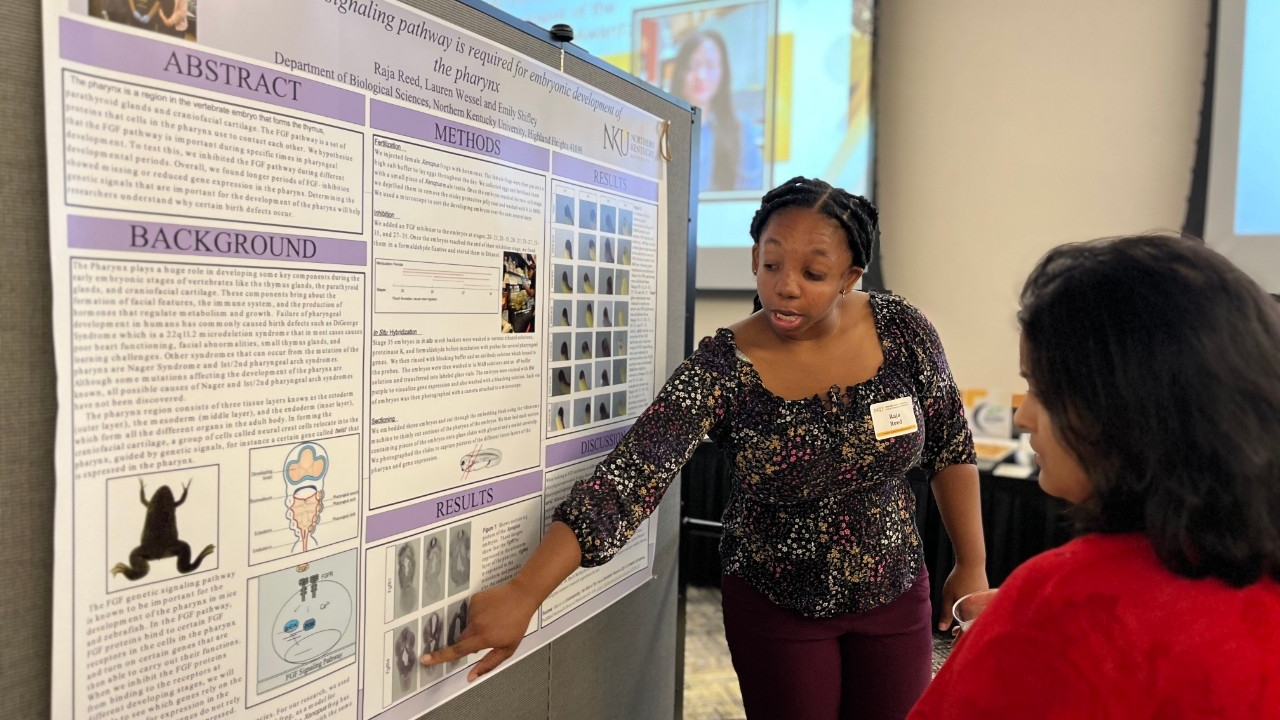 Biology major present their research poster at the Heather Bullen Summer Celebration of Research.