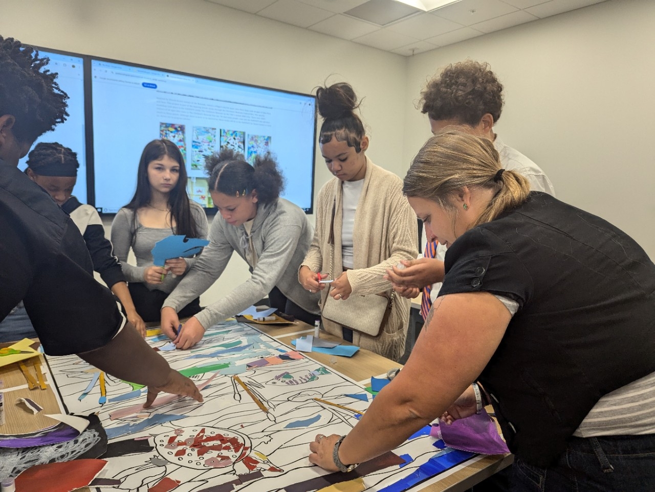 Middle school group participating in art activity