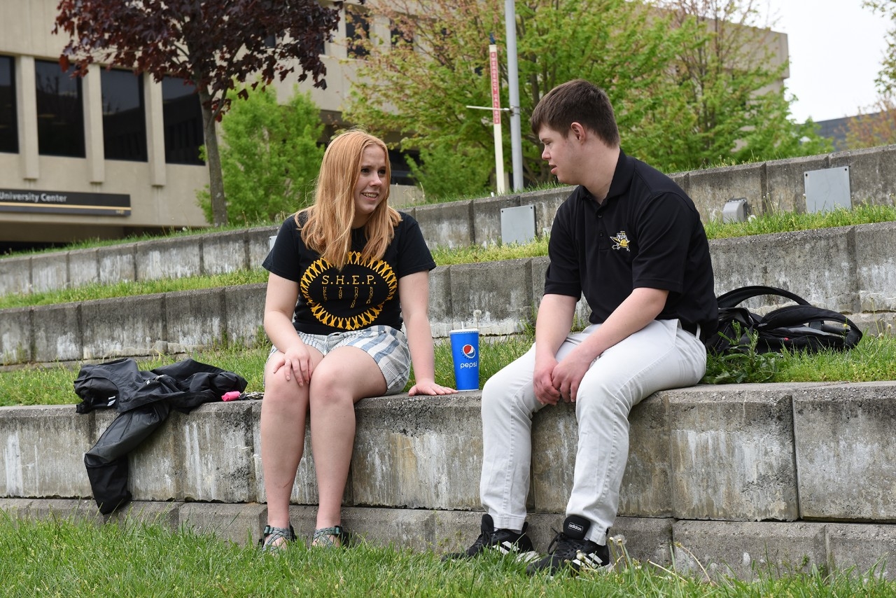 SHEP students sitting outside