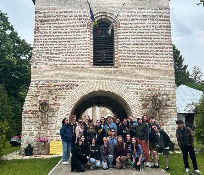 Students pose in Romania during Kelly Moffett's Creative Writing in Transylvania study abroad program in May of 2024. 